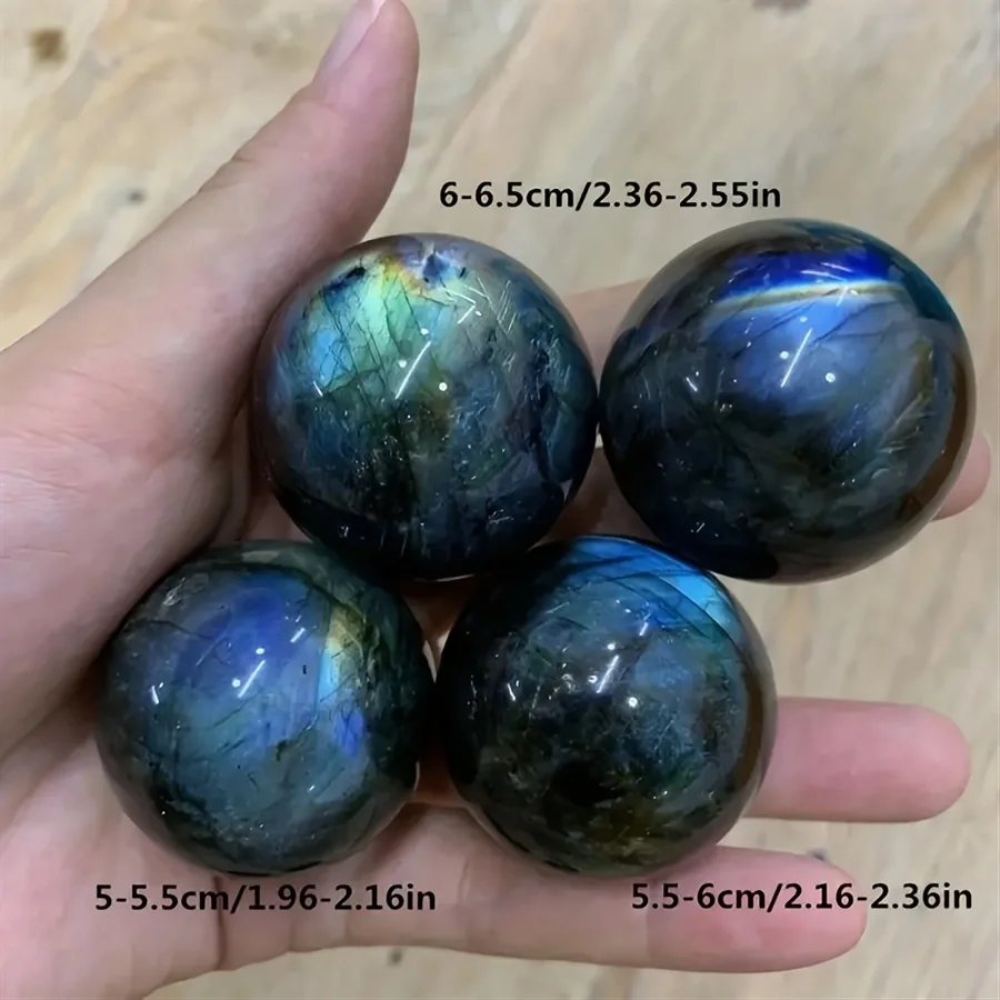 spheres-labradorite-naturelle-tailles-5-6-6cm Sphères de labradorite naturelle de différentes tailles (5-6.5 cm), avec reflets bleus et dorés pour décoration et énergie protectrice