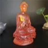 Statue de Bouddha en résine translucide colorée en posture méditative, décoration Feng Shui apaisante